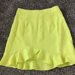 Neon yellow ruffle mini skirt